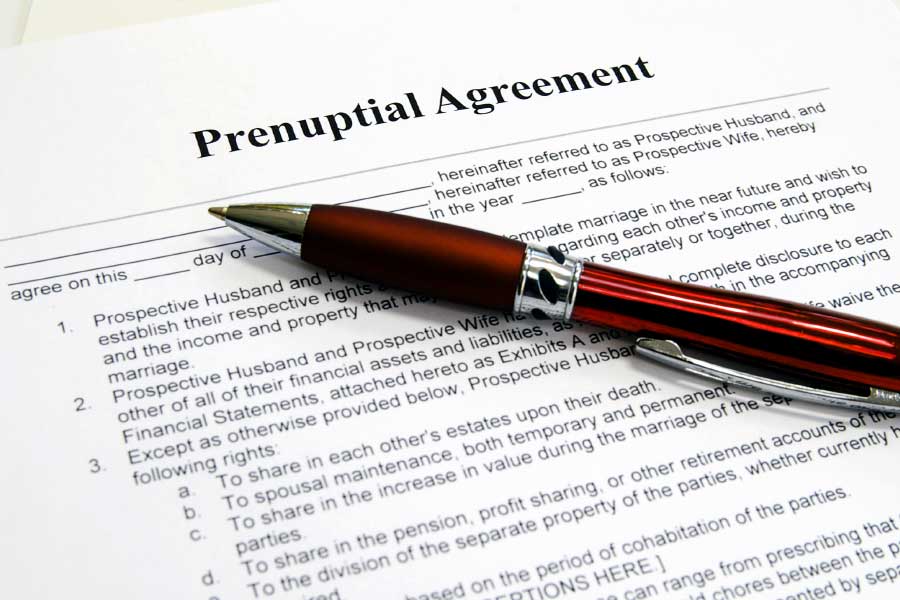 Close up of a prenuptial agreement and pen