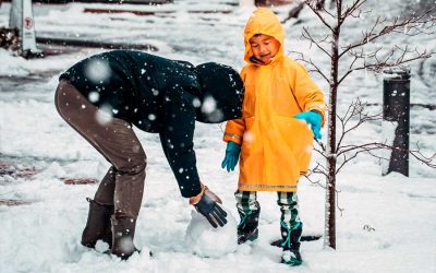 parent and child playing in snow 400x250 - Home