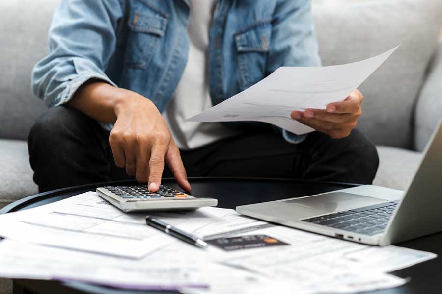 Man going through his family debts during a divorce