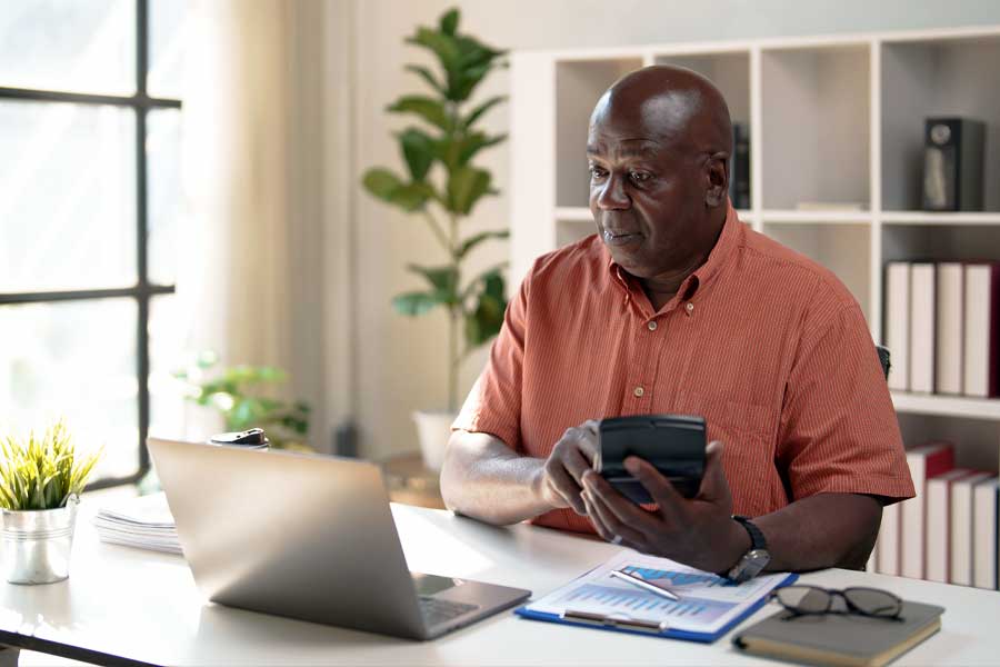 Man focused on retirement budgeting after a divorce